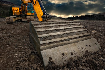 Image of tractor removing dirt