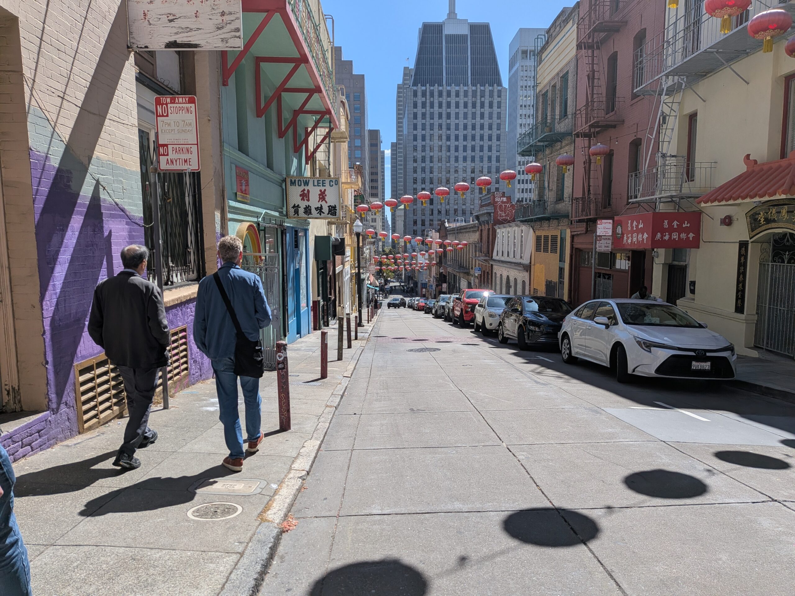 Michael B. Dianich, Jr. walking with Chinatown community leader and tour guide David Lei